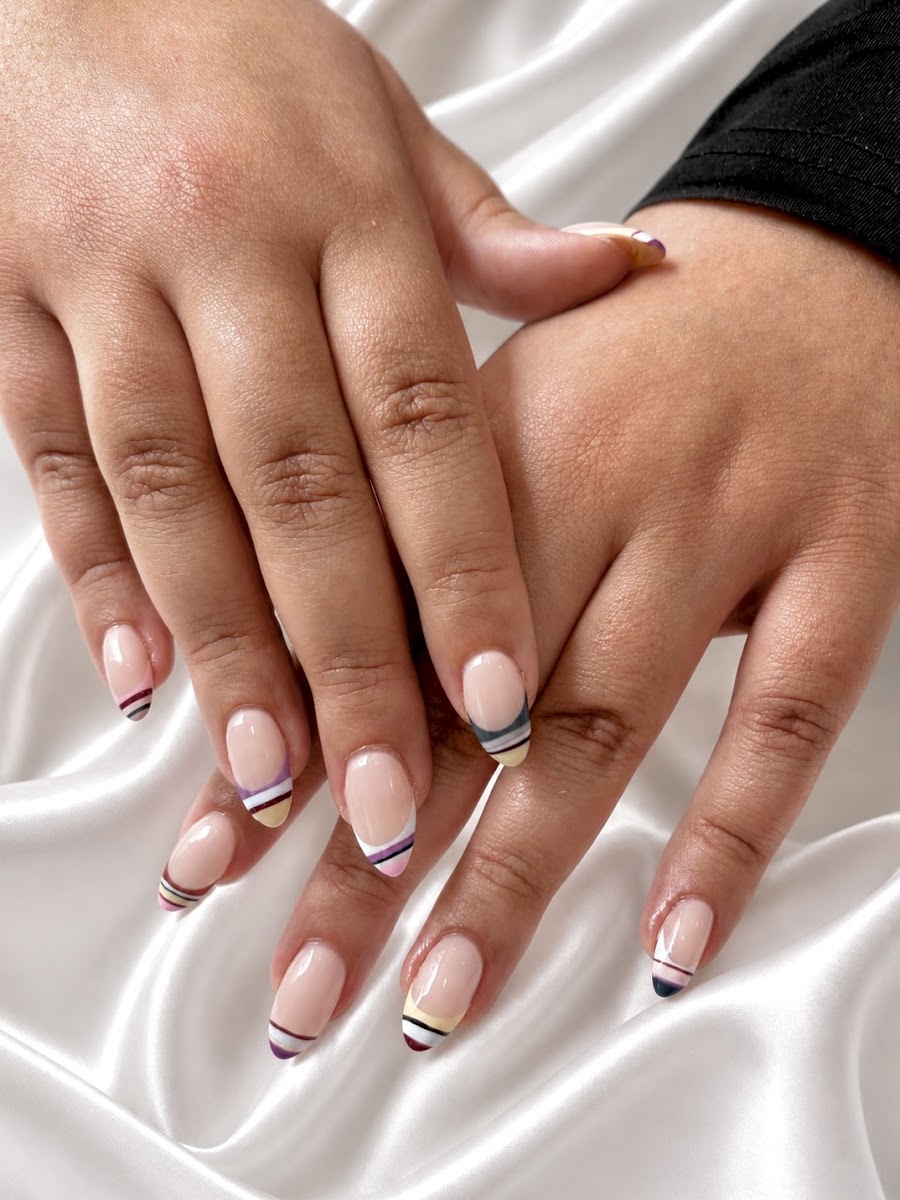 Minimal French manicure with gold detail