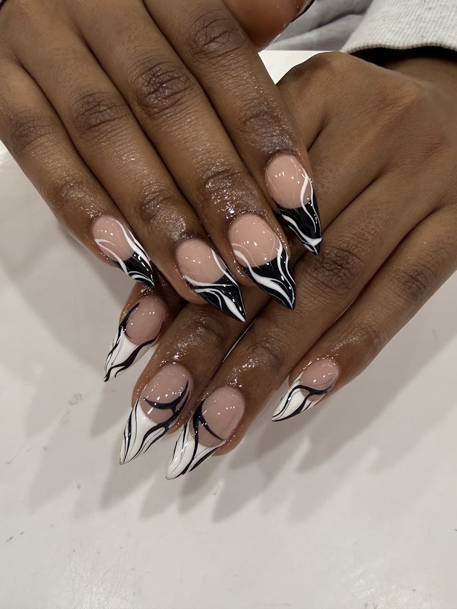 Black and white sculpted nail design